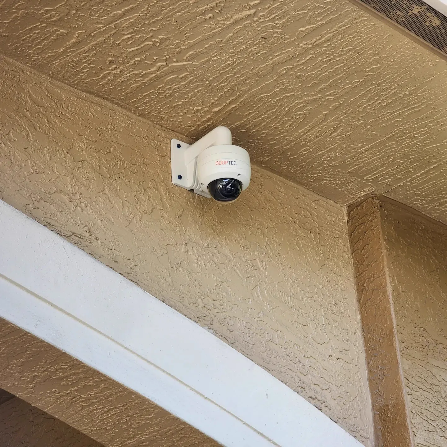Camera installed under a roof eave